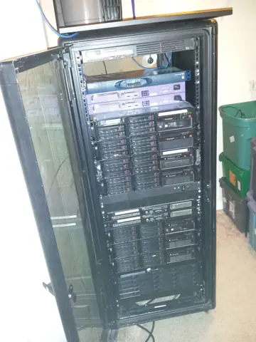Jan 2015. The first 30U rack, wedged into a hallway closet, purple Extreme Networks switches up top.